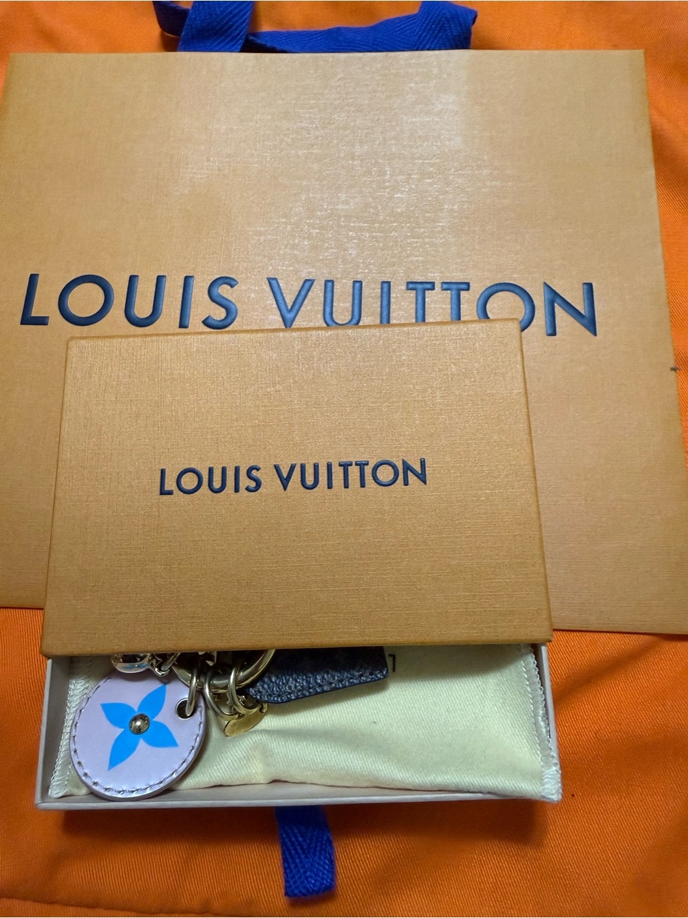Louis Vuitton bag charm includes box dust and shopping bag